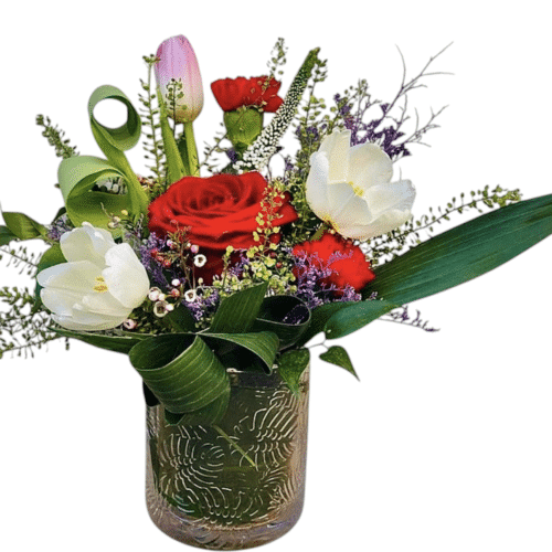 Rose and tulip flower arrangement in glass vase Malta