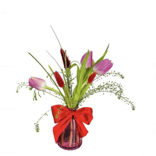 Pink tulip arrangement in glass vase with ribbon Malta