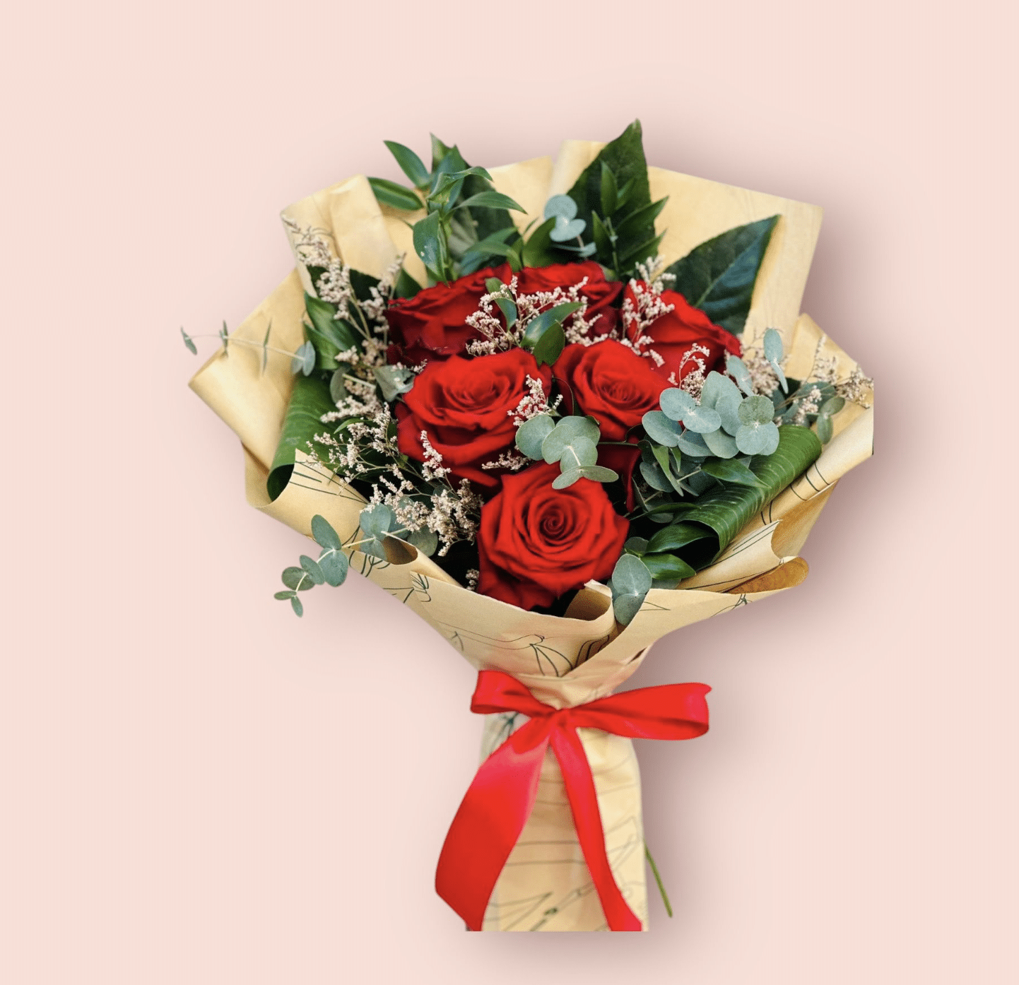 6 red rose bouquet with limonium dry flowers and green foliage wrapped in elegant paper and red ribbon