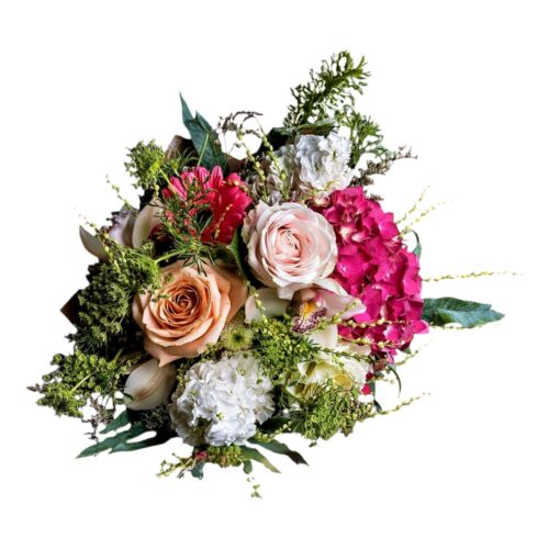 Luxury bouquet featuring hydrangeas, roses, orchids and seasonal flowers in pink, blush and ivory tones