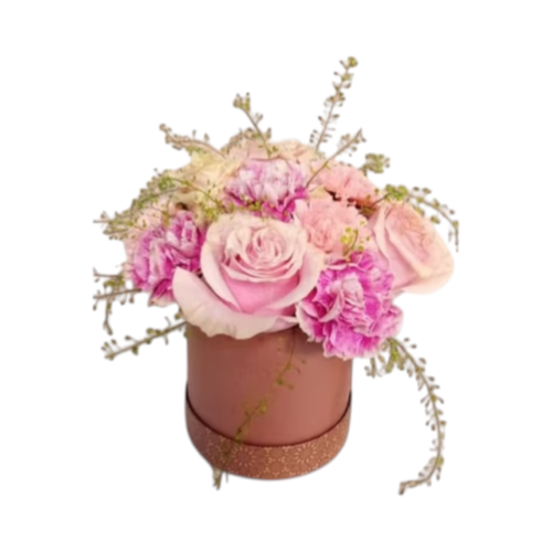 Pink flower hat box with roses carnations and seasonal fillers in round box Malta